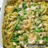 Classic pasta tetrazzini with a fun twist using basil pesto and chicken! This is the ultimately easy pan of comfort food that the entire family will adore.