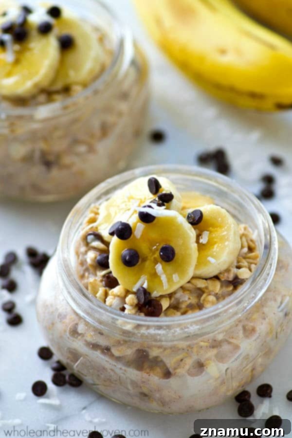 Chai Spiced Banana Overnight Oats 3 Overhead view of a prepared jar of Banana Chai Spice Overnight Oats, with a spoon ready to dive in.