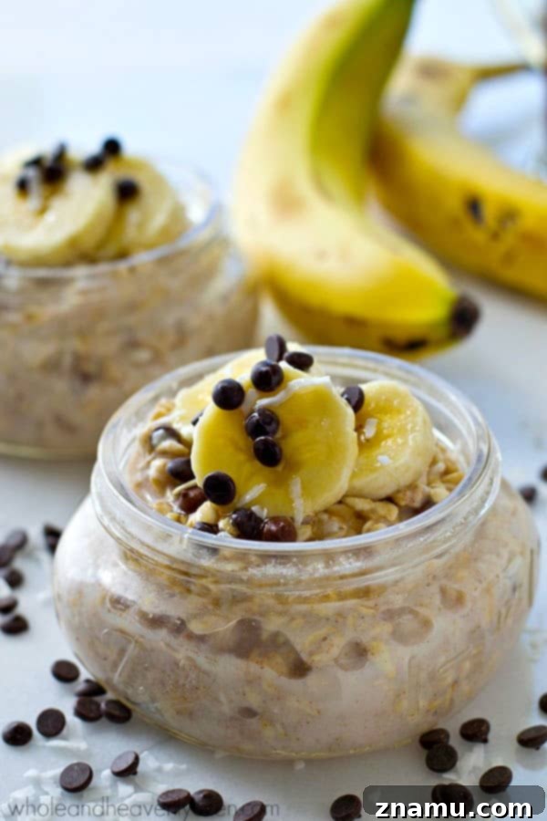 Chai Spiced Banana Overnight Oats 6 Hand holding a spoon, scooping a spoonful of delicious Banana Chai Spice Overnight Oats.