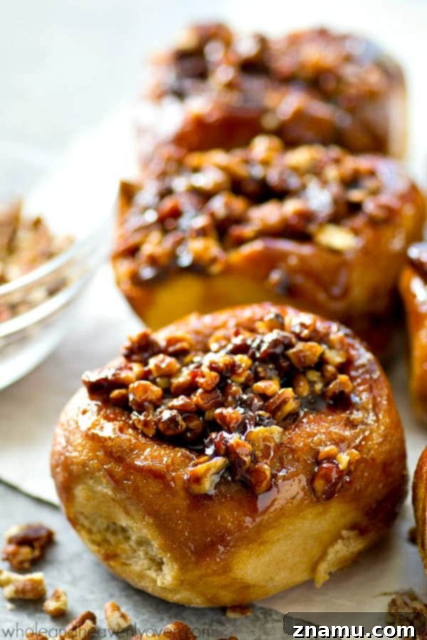 Zesty Orange Raspberry Swirl Buns 11 Delicious Pecan Sticky Buns covered in rich caramel topping for the ultimate breakfast treat.
