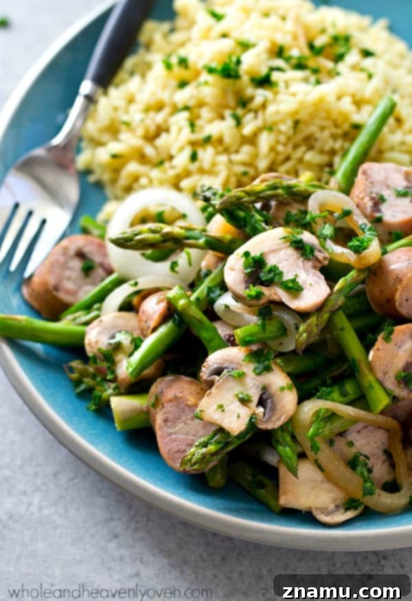 Balsamic Sausage, Asparagus and Mushroom Skillet 2 Delicious one-skillet balsamic sausage, asparagus, and mushroom dinner served with rice.