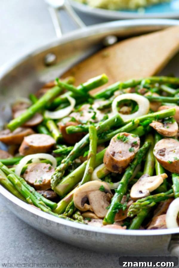 Balsamic Sausage, Asparagus and Mushroom Skillet 3 Close-up of skillet dinner with asparagus, sausage, and mushrooms.