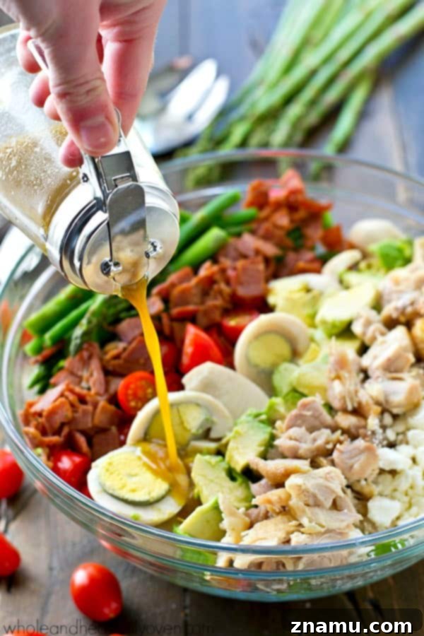 Bright Asparagus Cobb Salad with a Tangy Red Wine Vinaigrette 7 A large, colorful Springtime Asparagus Cobb Salad drizzled with red wine vinaigrette