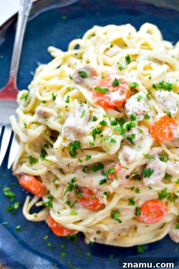 Unbelievably creamy fettuccine that tastes like chicken pot pie in pasta form! Made in one pot and ready for the dinner table in only 35 minutes.