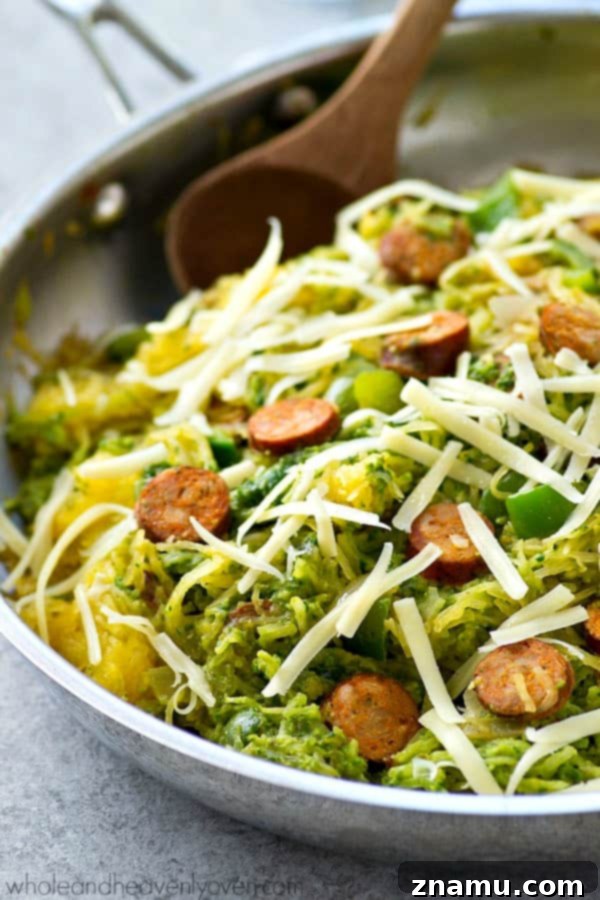 One-Pan Pesto Sausage Spaghetti Squash 2 Spaghetti squash loaded with flavorful pesto and lots of sliced sausage! An easy and healthy skillet dinner with only 7 ingredients!