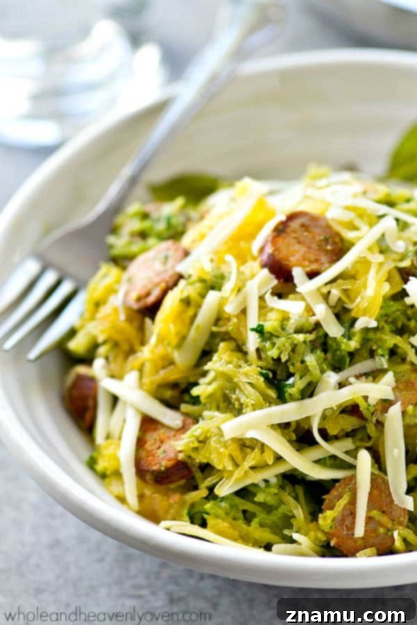 One-Pan Pesto Sausage Spaghetti Squash 3 Spaghetti squash loaded with flavorful pesto and lots of sliced sausage! An easy and healthy skillet dinner with only 7 ingredients!