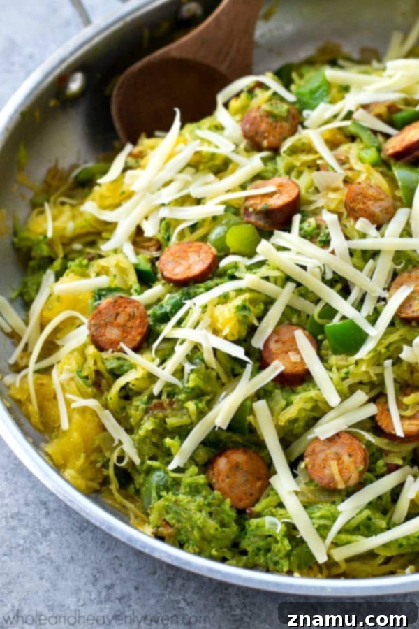 One-Pan Pesto Sausage Spaghetti Squash 4 Spaghetti squash loaded with flavorful pesto and lots of sliced sausage! An easy and healthy skillet dinner with only 7 ingredients!