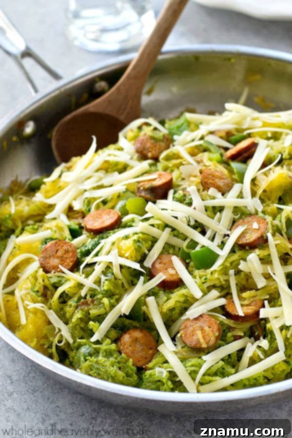 One-Pan Pesto Sausage Spaghetti Squash 7 Spaghetti squash loaded with flavorful pesto and lots of sliced sausage! An easy and healthy skillet dinner with only 7 ingredients!