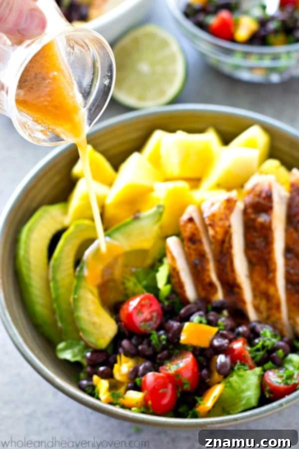 Vibrant Tropical Grilled Chicken Mexican Salad Bowls 7 Another stunning angle of the Tropical Grilled Chicken Mexican Salad, highlighting the fresh, vibrant colors and textures of the ingredients and the homemade chipotle vinaigrette.