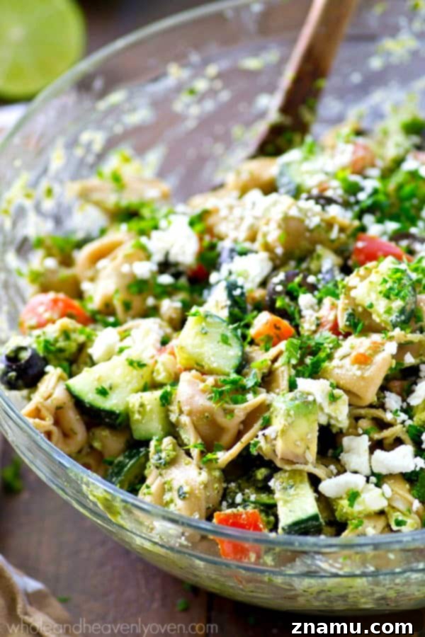 Zesty Greek Pesto Tortellini Salad 5 Your new favorite summer salad! This easy tortellini pasta salad is piled high with Greek-style goodness and tossed in an amazing pesto dressing.