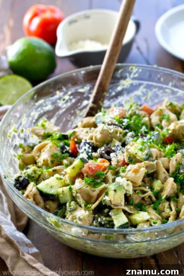 Zesty Greek Pesto Tortellini Salad 6 Your new favorite summer salad! This easy tortellini pasta salad is piled high with Greek-style goodness and tossed in an amazing pesto dressing.