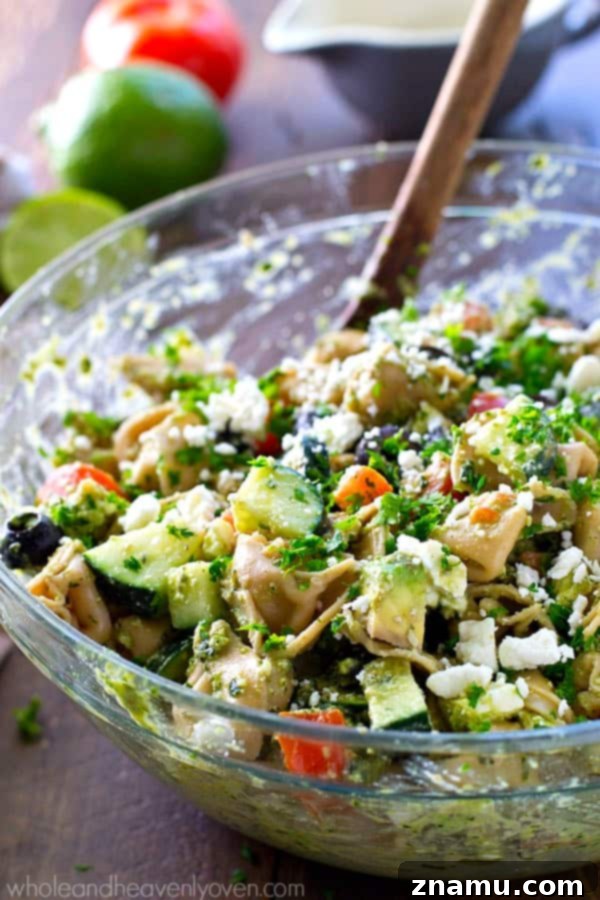 Zesty Greek Pesto Tortellini Salad 7 Your new favorite summer salad! This easy tortellini pasta salad is piled high with Greek-style goodness and tossed in an amazing pesto dressing.