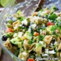 Zesty Greek Pesto Tortellini Salad 9 Your new favorite summer salad! This easy tortellini pasta salad is piled high with Greek-style goodness and tossed in an amazing pesto dressing.