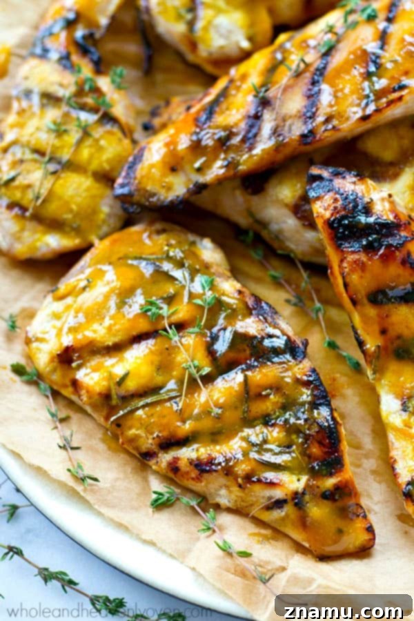 Sweet & Tangy Honey Mustard Grilled Chicken Cutlets 7 Various grilled chicken pieces served with a side of honey mustard for dipping.