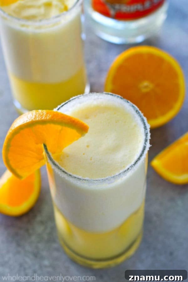 Easy 5-ingredient orange creamsicle cocktail slushies prepared in minutes for instant refreshment.