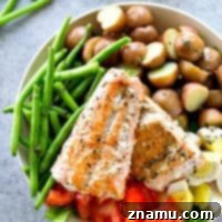 Seared Salmon Nicoise Salad with Roasted Garlic Herb Dressing