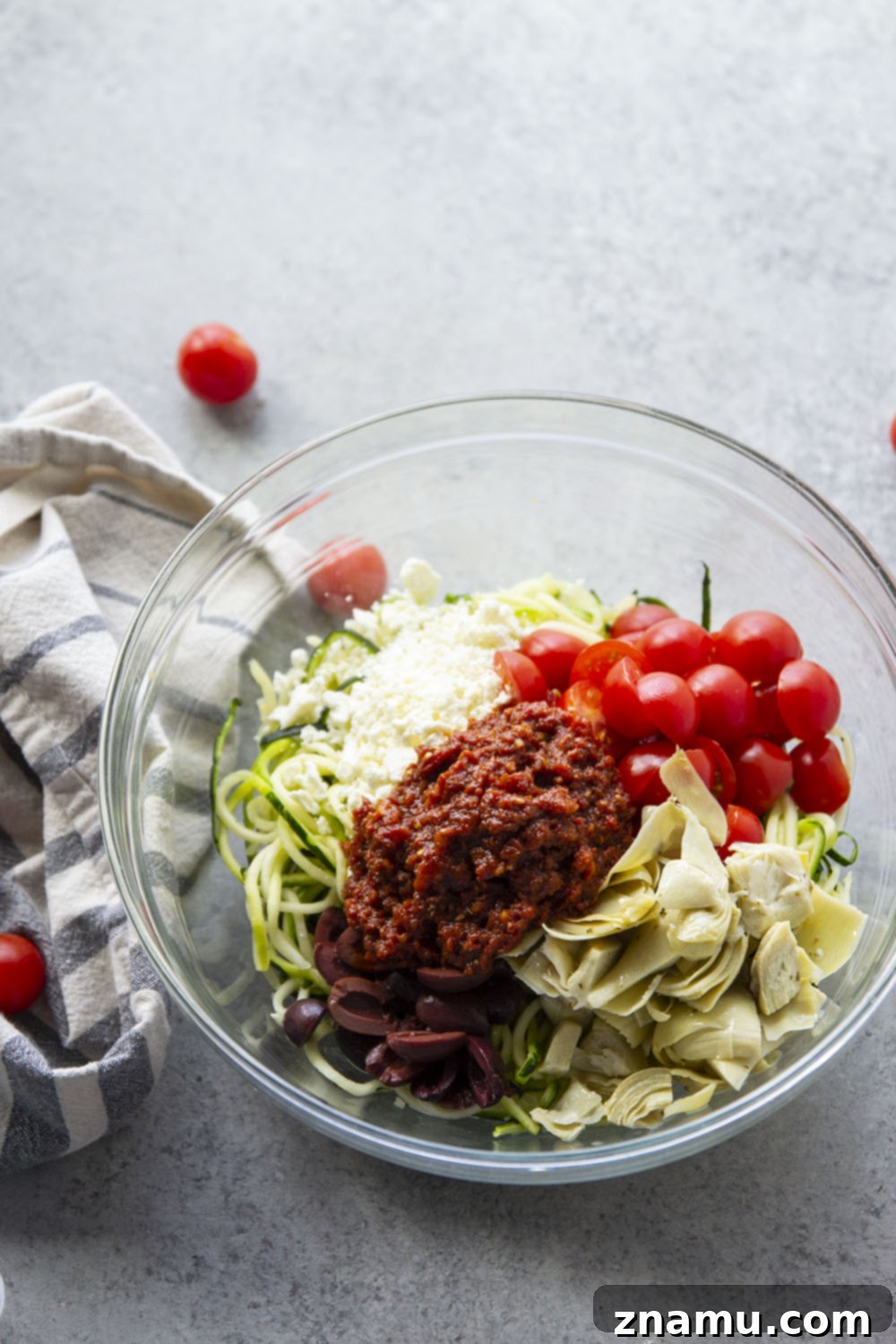 Sun-Drenched Mediterranean Zoodle Salad 3 Loaded with tons of fresh, healthy Mediterranean goodness and a flavorful sun-dried tomato dressing, this Mediterranean zucchini noodle salad will quickly become a favorite!