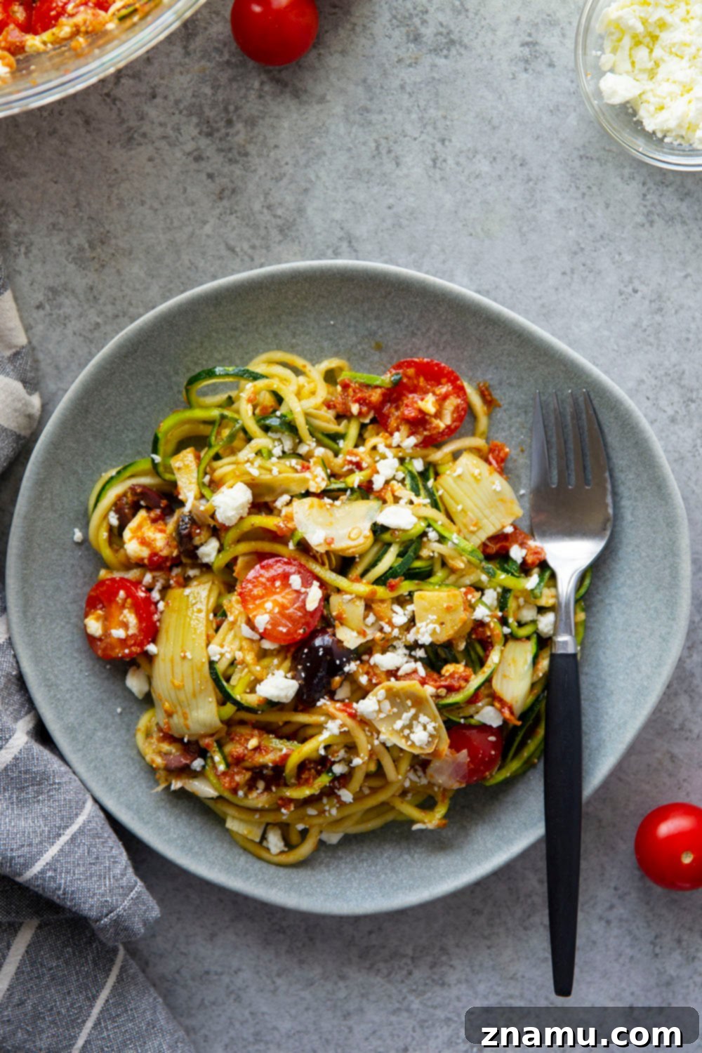 Sun-Drenched Mediterranean Zoodle Salad 4 Loaded with tons of fresh, healthy Mediterranean goodness and a flavorful sun-dried tomato dressing, this Mediterranean zucchini noodle salad will quickly become a favorite!