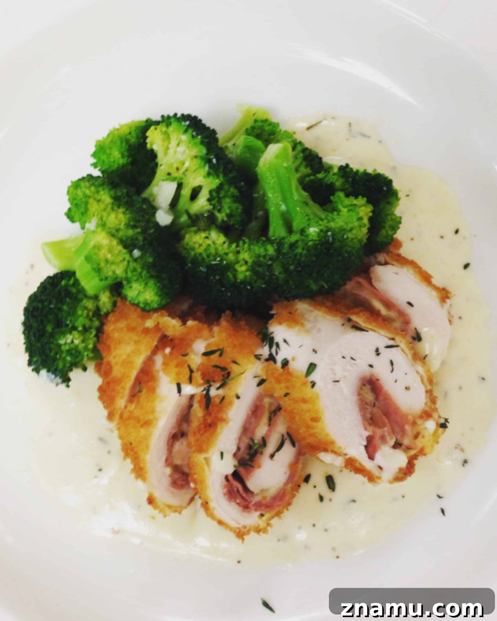 Kitchen Secrets: The Ongoing Culinary Quest 5 Elegant Plating of a Main Course with Garnish