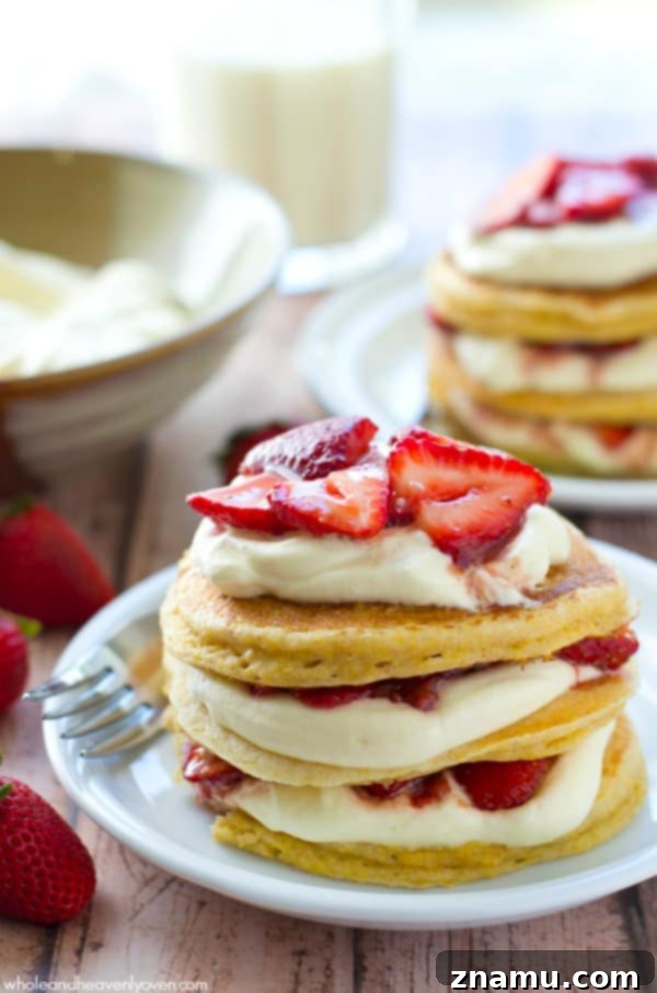 One-Pan Strawberry Shortcake 10 Layered pancake towers featuring fresh strawberries and whipped cream, a delightful and impressive breakfast or brunch option