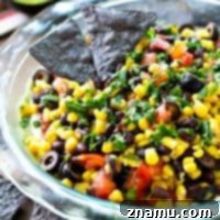 Southwest Guac Fiesta 9 This colorful Southwestern-style taco dip will be the biggest hit of your party.---So many layers of homemade guacamole and all your favorite taco toppings!
