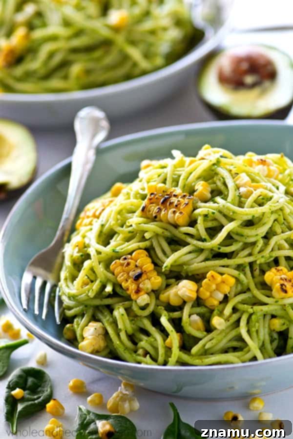 Creamy Avocado Pesto Spaghetti with Smoky Grilled Corn 3 A vibrant and healthy pasta dish featuring creamy avocado pesto and charred grilled corn.