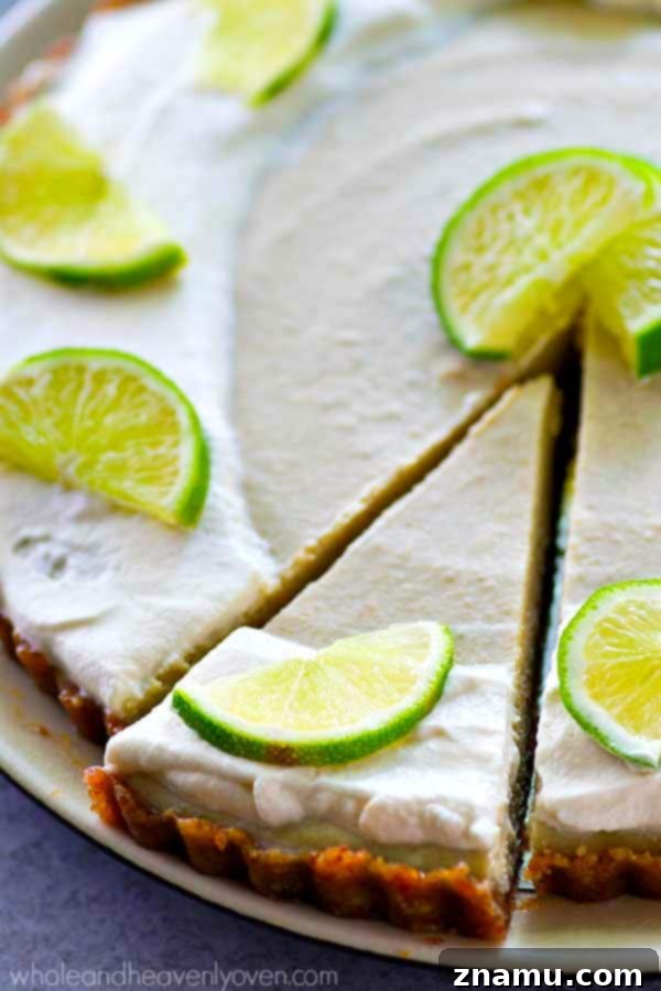 Effortless Key Lime Cheesecake Tart 4 Overhead view of a beautifully prepared no-bake key lime cheesecake tart