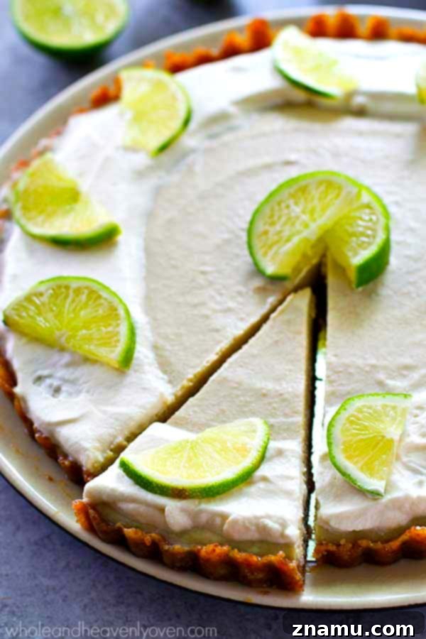 Effortless Key Lime Cheesecake Tart 6 No-bake key lime cheesecake tart, ready to be sliced and served