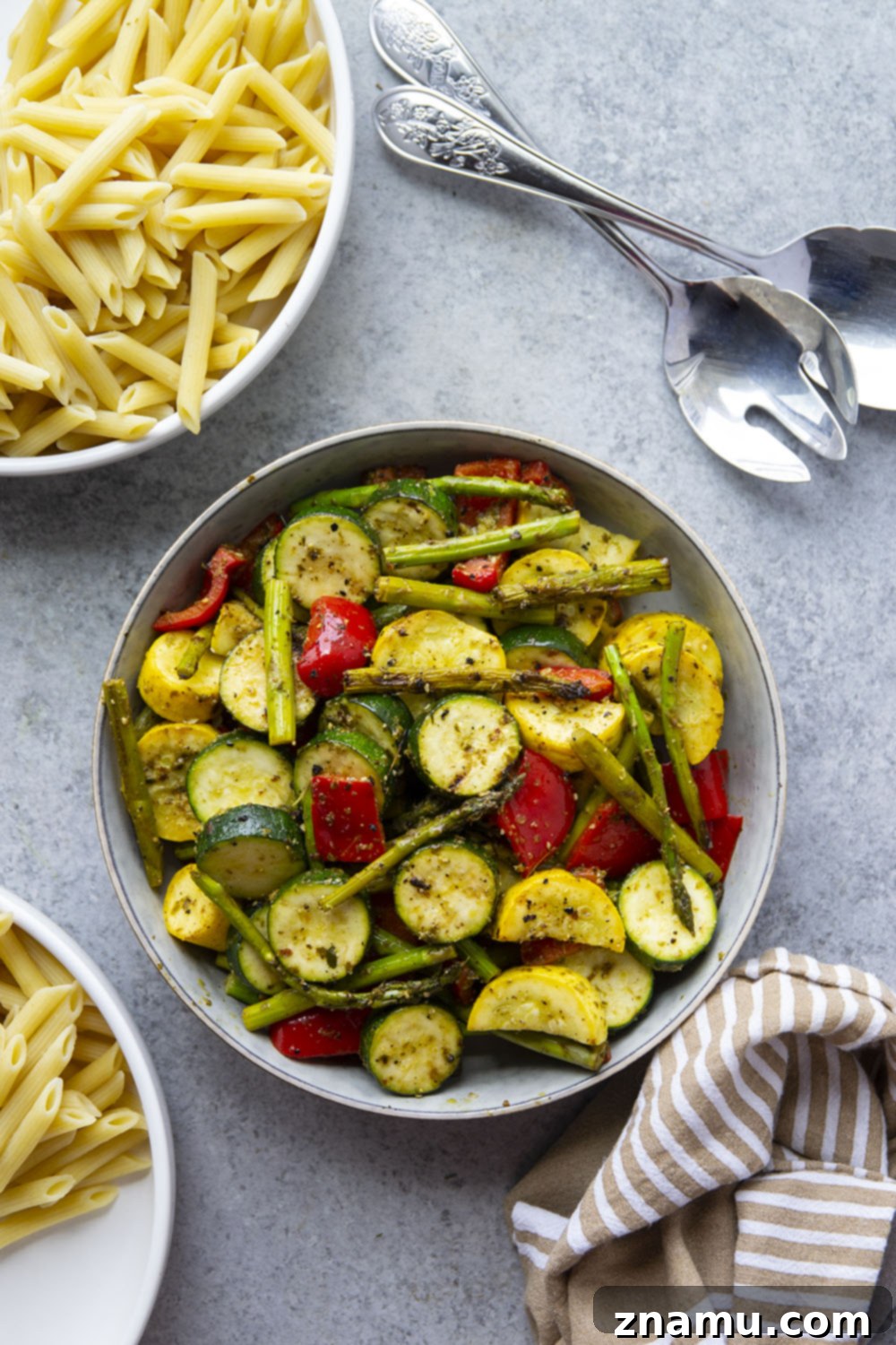 Smoky Veggie Pesto Penne 3 Tossed in flavorful pesto and grilled to smoky perfection, these pesto grilled vegetables are incredible piled over penne pasta and a great way to use up summer produce!