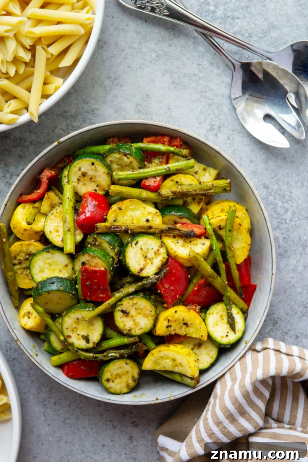 Smoky Veggie Pesto Penne 5 Tossed in flavorful pesto and grilled to smoky perfection, these pesto grilled vegetables are incredible piled over penne pasta and a great way to use up summer produce!