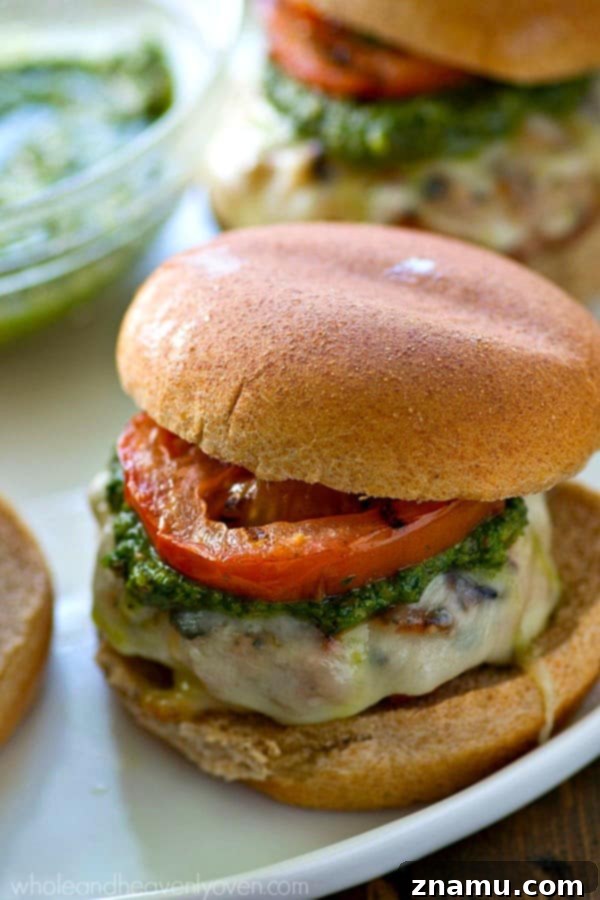Grilled Pesto Turkey Burgers with Melted Mozzarella and Smoky Tomatoes 7 Full spread of Pesto Mozzarella Turkey Burgers with grilled tomatoes and fresh ingredients