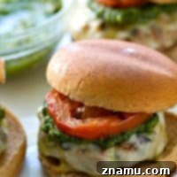 Grilled Pesto Turkey Burgers with Melted Mozzarella and Smoky Tomatoes 9 Pesto Mozzarella Turkey Burgers with Grilled Tomatoes recipe image