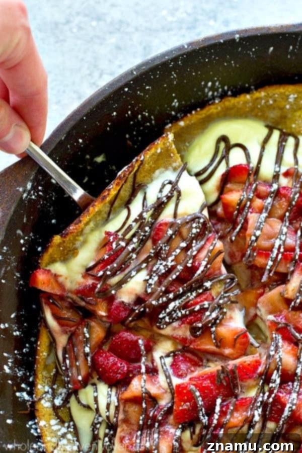 Strawberry Shortcake Oven Puff 4 Freshly sliced, ripe strawberries gently tossed with sugar, creating a glistening, juicy filling for the Dutch Baby.
