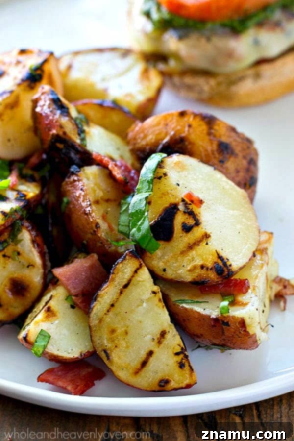 Grill-Kissed Red Potato Salad with Bacon-Basil Vinaigrette 5 Platter of quartered red potatoes lightly brushed with olive oil, ready for grilling to create a smoky base for the potato salad.