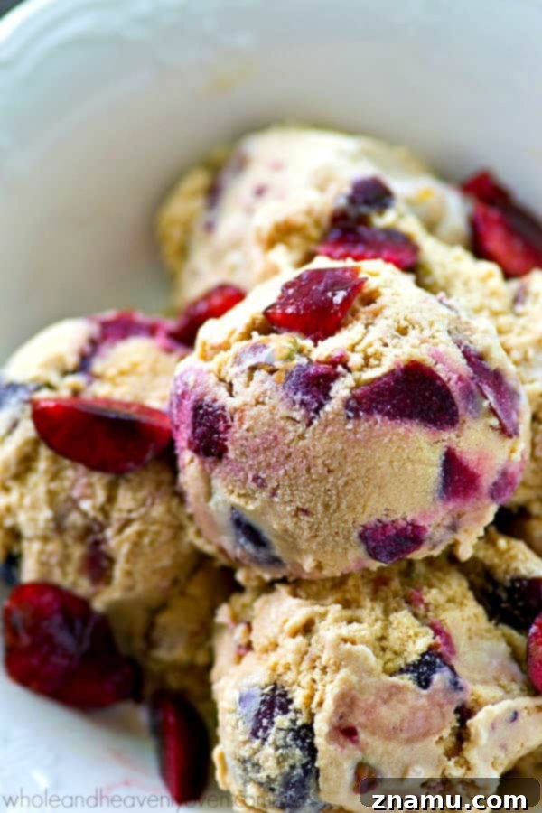 Kitchen Aid Ice Cream Maker in Action A new Kitchen Aid ice cream maker attachment churning a creamy vanilla base.