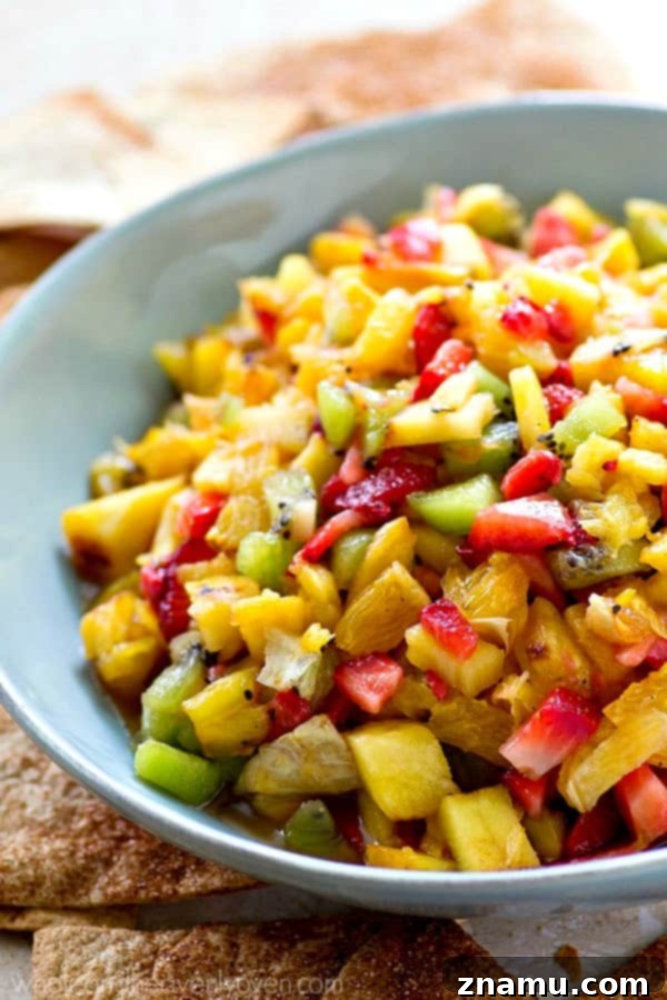 Caramelized Pineapple Salsa with Spiced Cinnamon Chips 2 Fresh pineapple grilled to sweet and smoky perfection, then tossed with fresh kiwi, strawberries, and orange for a killer summer fruit salsa, served with cinnamon tortilla chips.