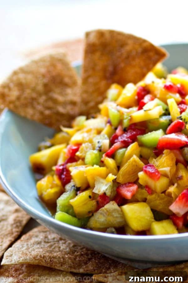 Caramelized Pineapple Salsa with Spiced Cinnamon Chips 6 Homemade cinnamon sugar tortilla chips arranged on a baking sheet, showing their golden brown and crispy texture.