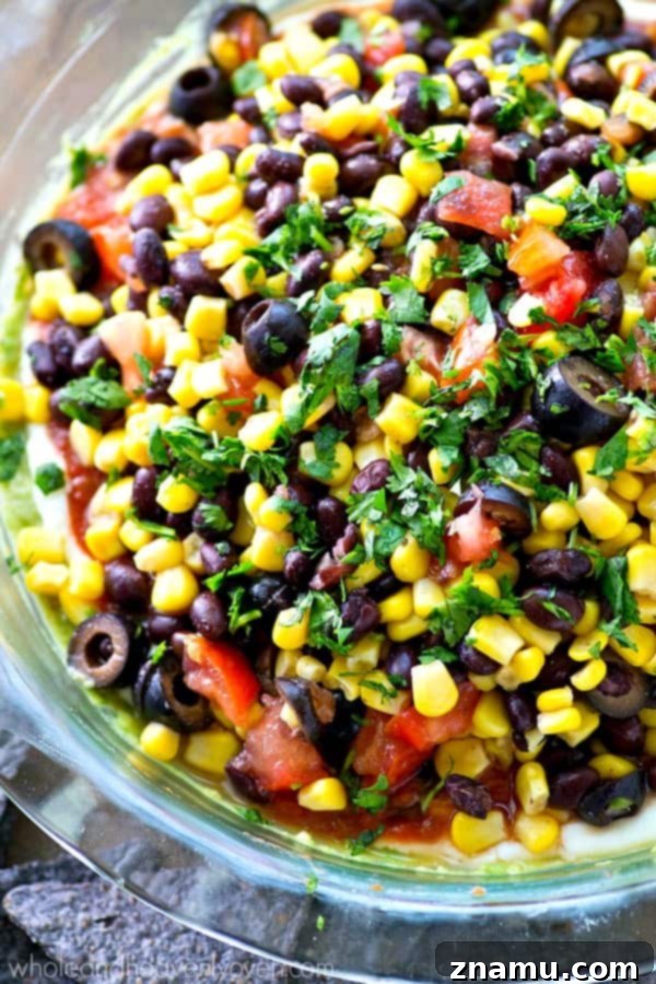 Caramelized Pineapple Salsa with Spiced Cinnamon Chips 10 This colorful Southwestern-style taco dip will be the biggest hit of your party.---So many layers of homemade guacamole and all your favorite taco toppings!