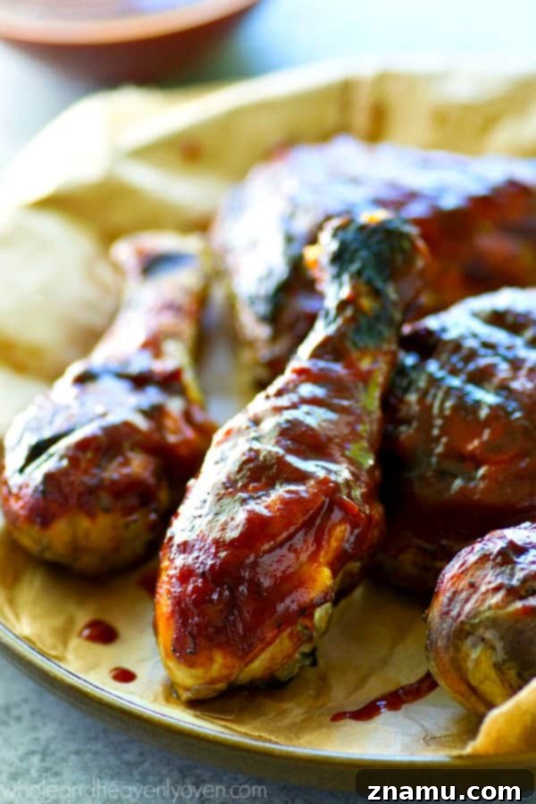 Homemade Grilled BBQ Chicken: A Sizzling Success Story 5 Seasoned chicken pieces on a hot grill, ready to be basted with BBQ sauce
