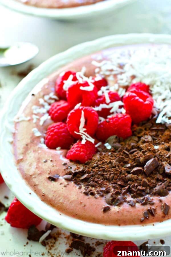 Rich Raspberry Dark Chocolate Smoothie Bowls 6 Artistically arranged raspberry dark chocolate smoothie bowl, showcasing vibrant colors