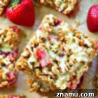 These summery crumb bars are packed with juicy strawberries, TONS of oatmeal streusel and glazed to perfection with a luscious browned butter glaze.---you'll be eating every last crumb!