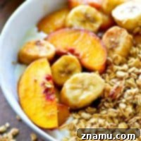 Ready for the ultimate power-packed summer breakfast? These granola yogurt bowls are piled high with warm caramel-y bananas and peaches and the EASIEST weekday breakfast ever!