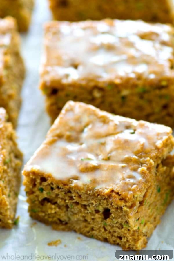 Moist Zucchini Sheet Cake with Tropical Pineapple Glaze 3 Close-up of freshly baked zucchini sheet cake, showcasing its moist texture and golden-brown crust, ready for glazing.