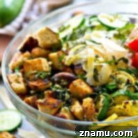 Grilled Summer Panzanella 9 Grilled Garden-Style Panzanella Salad with fresh vegetables and grilled croutons.