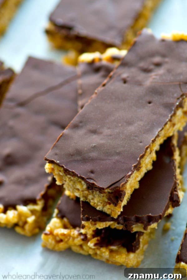 No-Bake Chocolate Cashew Butter Crunch Bars 2 Healthy no-bake chocolate cashew butter rice krispie treats with silky chocolate topping.