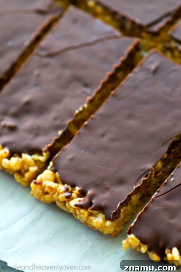 No-Bake Chocolate Cashew Butter Crunch Bars 4 Stack of healthy no-bake chocolate cashew butter rice krispie treats.