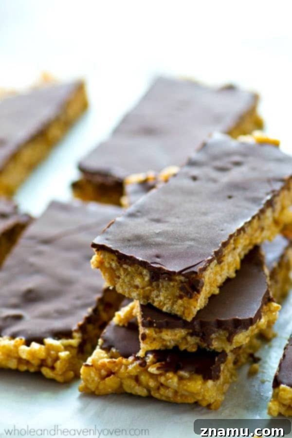 No-Bake Chocolate Cashew Butter Crunch Bars 5 Prepared pan of healthy no-bake rice krispie treats with chocolate topping.