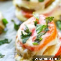 Caprese Towers with Heirloom Tomatoes and Eggplant 8 These layered caprese stacks feature fresh heirloom tomatoes, eggplant, and plenty of mozzarella cheese and fresh basil.---Ready in 15 minutes with only FIVE ingredients!