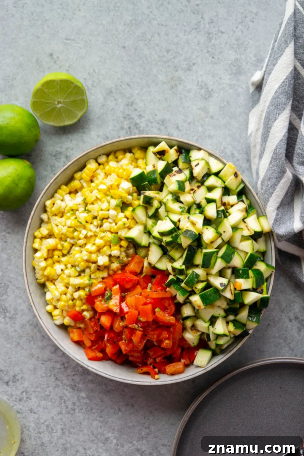 Preparing ingredients for Charred Zucchini Sweet Corn Mexican Salad