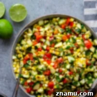 Smoky grilled zucchini, charred sweet corn, and tons of other summery goodness collide in this sweet corn Mexican salad that's easy to whip up and packed with flavor!